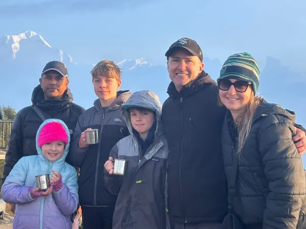 family trekking to Poon Hill Nepal