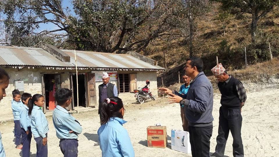 Community members receiving warm clothing